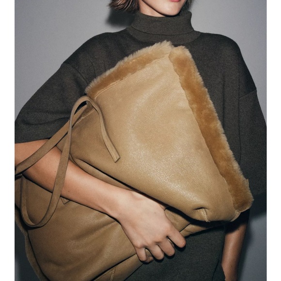 REVERSIBLE LEATHER BAG